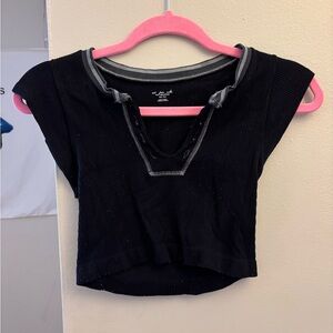 Urban Outfitters out from under black crop top
